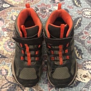 Kids Merrell hiking boots.